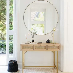 Espejo de pared ALICE redondo de metal dorado