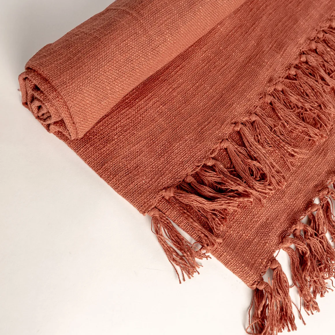 Manta terracota con flecos 125x150cm